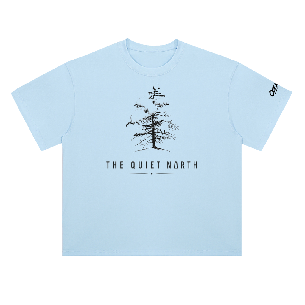 Light blue cotton drop-shoulder T-shirt with tree graphic and The Quiet North text.