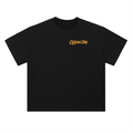 Black drop-shoulder cotton T-shirt with 'OCEAN ORK' orange chest logo
